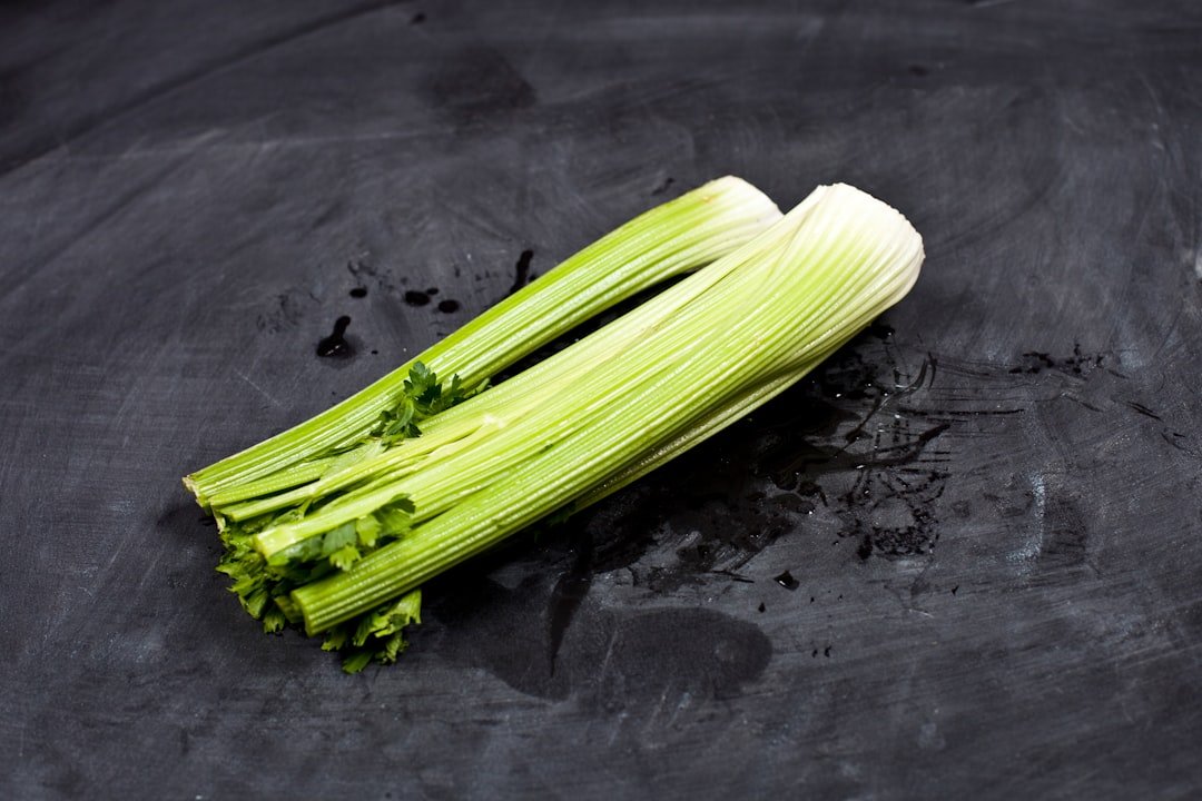 A bunch of celery sitting on top of a table